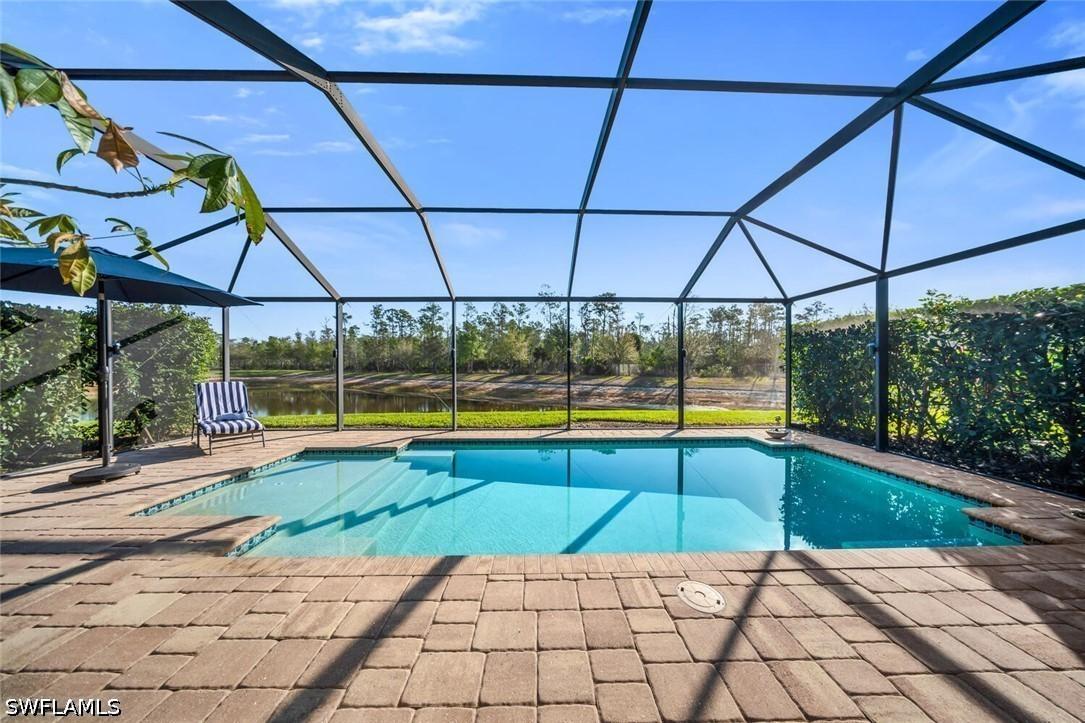 7457 Winding Cypress Dr., Naples, FL 34114