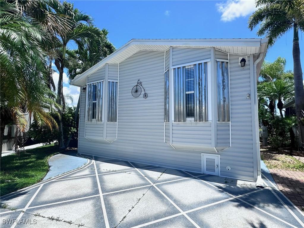 1128 Jade Lake Point, Naples, FL 34114