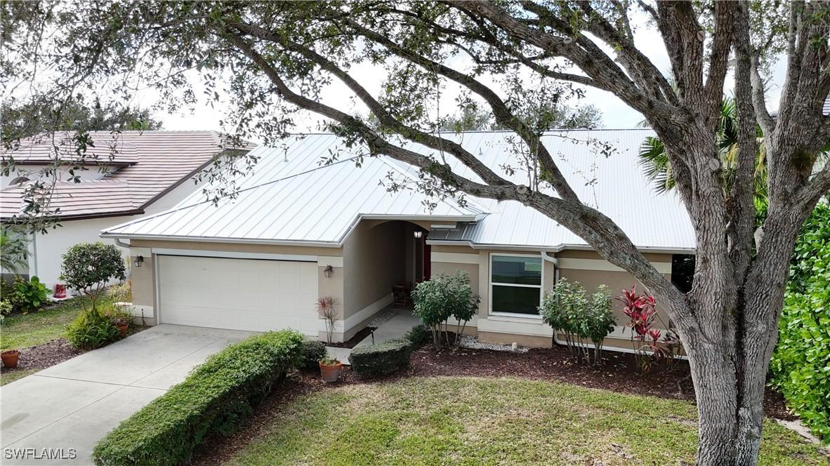 10987 Fieldfair Dr., Naples, FL 34119