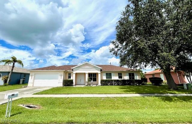 589 Genevieve Dr., Lehigh Acres, FL 33936