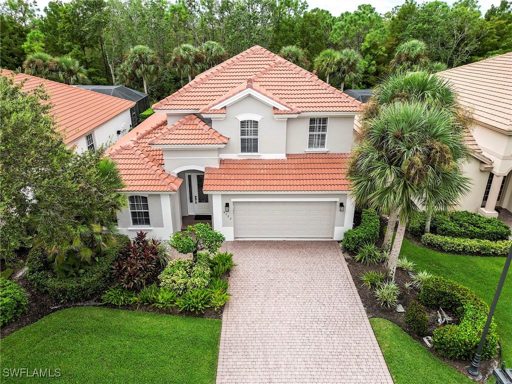 9127 Falling Leaf Dr., Estero, FL