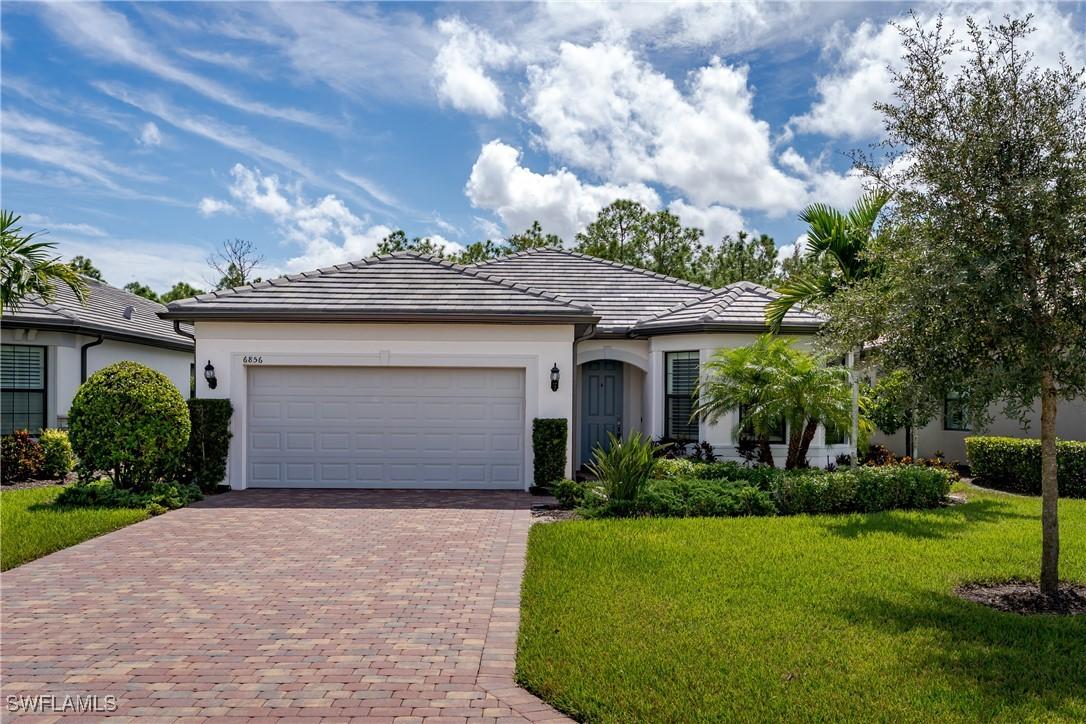 6856 Winding Cypress Dr., Naples, FL 34114