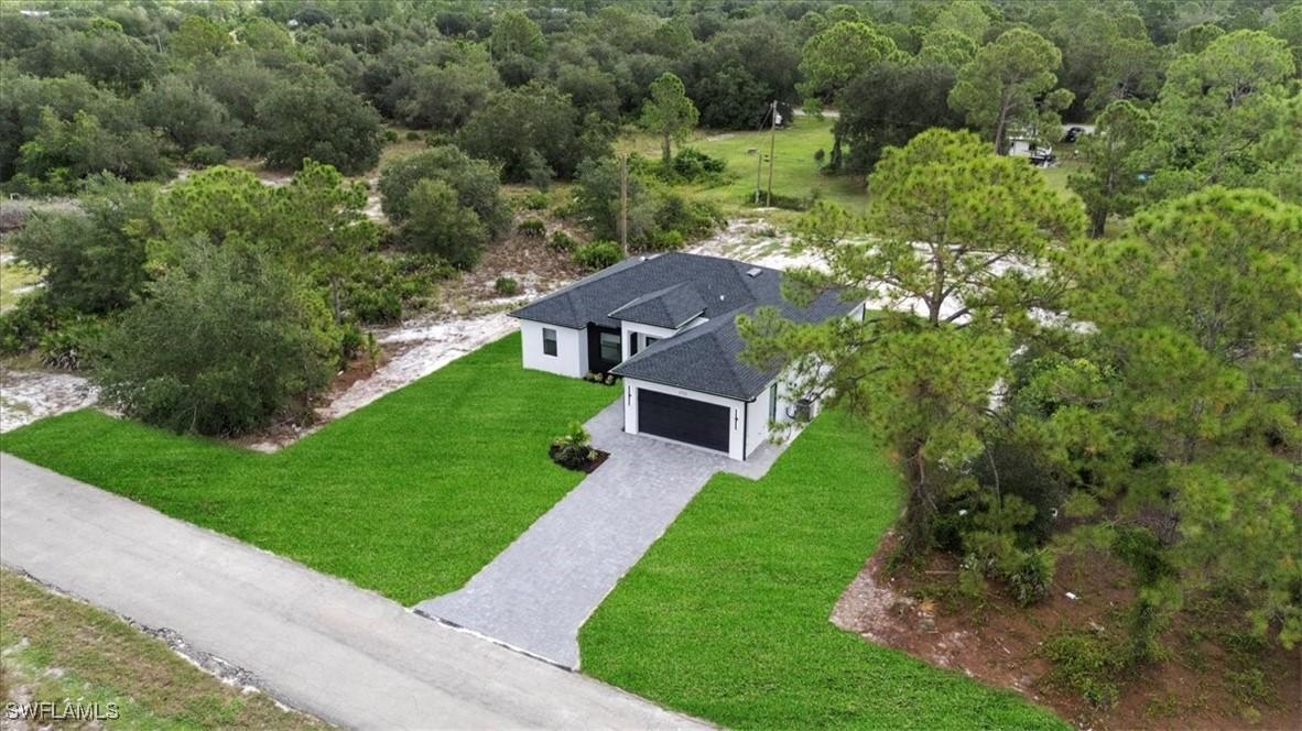 1712 Plumosa Ave., Lehigh Acres, FL 33972