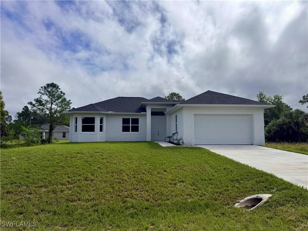 523 Harry Thayer Ave., Lehigh Acres, FL 33974