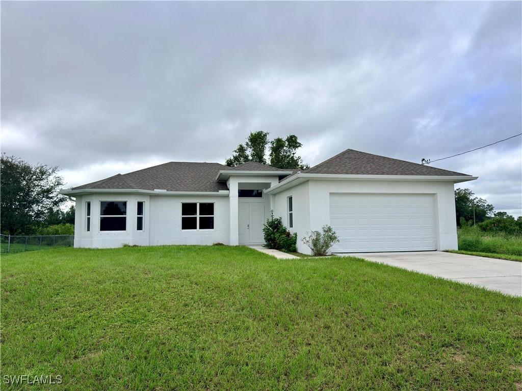 856 William Denver St., Lehigh Acres, FL 33974