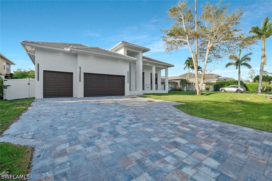 1317 Cypress Woods Dr., Naples, FL 34103