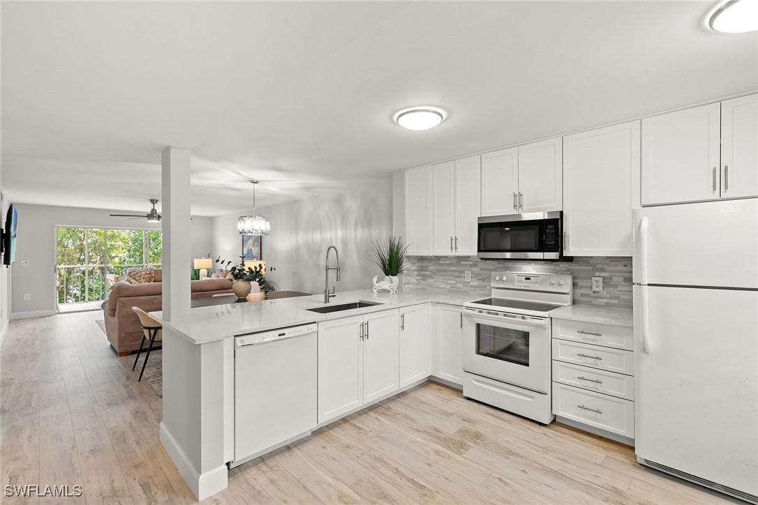 3071 Sandpiper Bay Cir. #L205, Naples, FL 34112