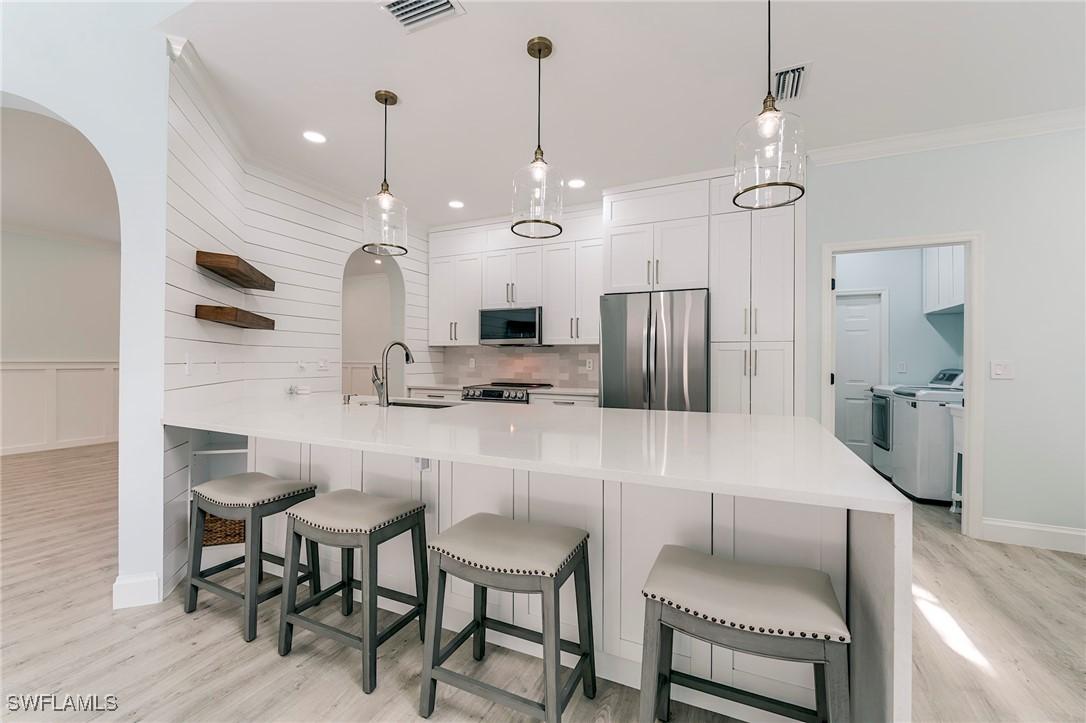 11534 Woodmount Ln., Estero, FL 33928