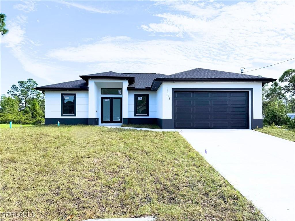 1133 Hatton Ave., Lehigh Acres, FL 33974