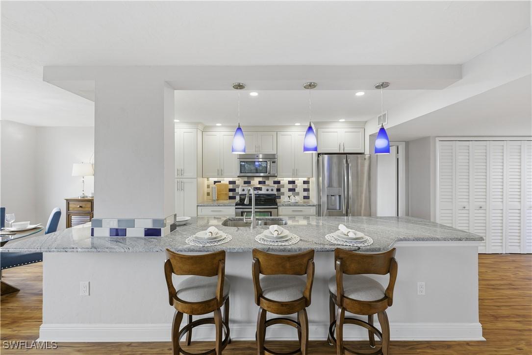 11 Bluebill Ave. #201, Naples, FL 34108