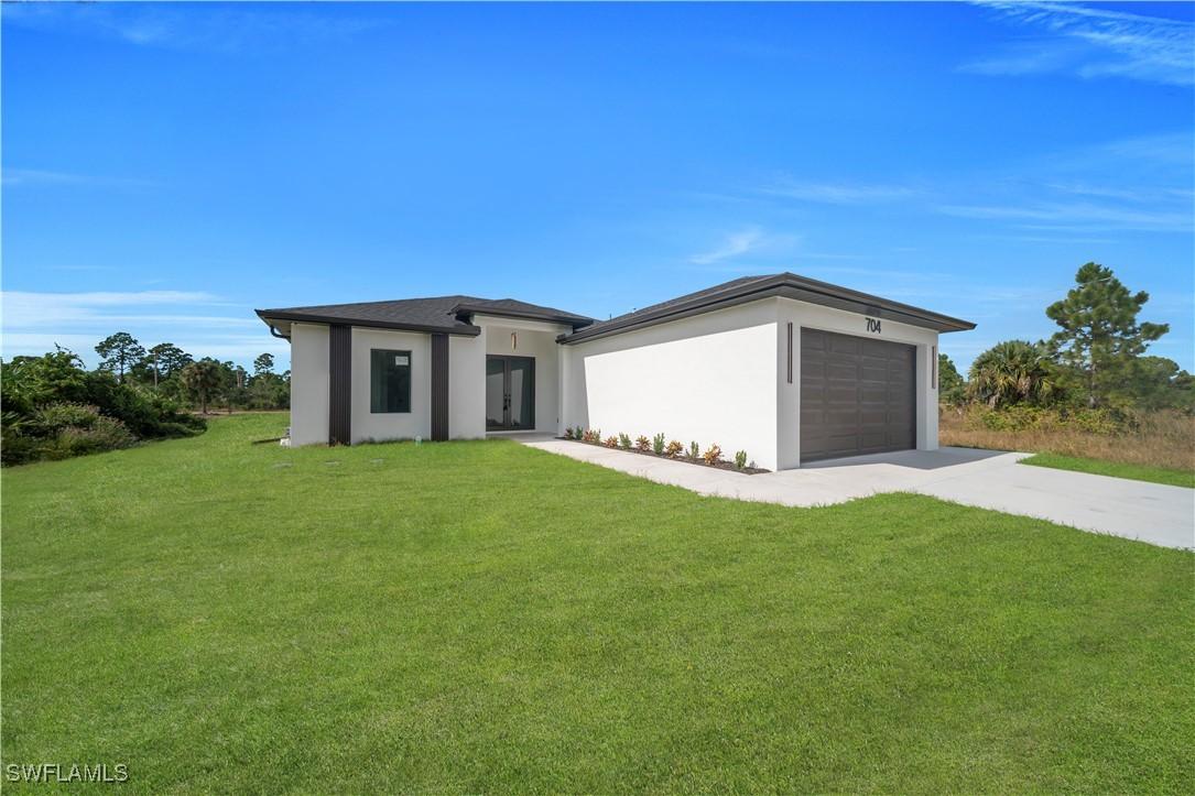 704 Holmes Ave., Lehigh Acres, FL 33974
