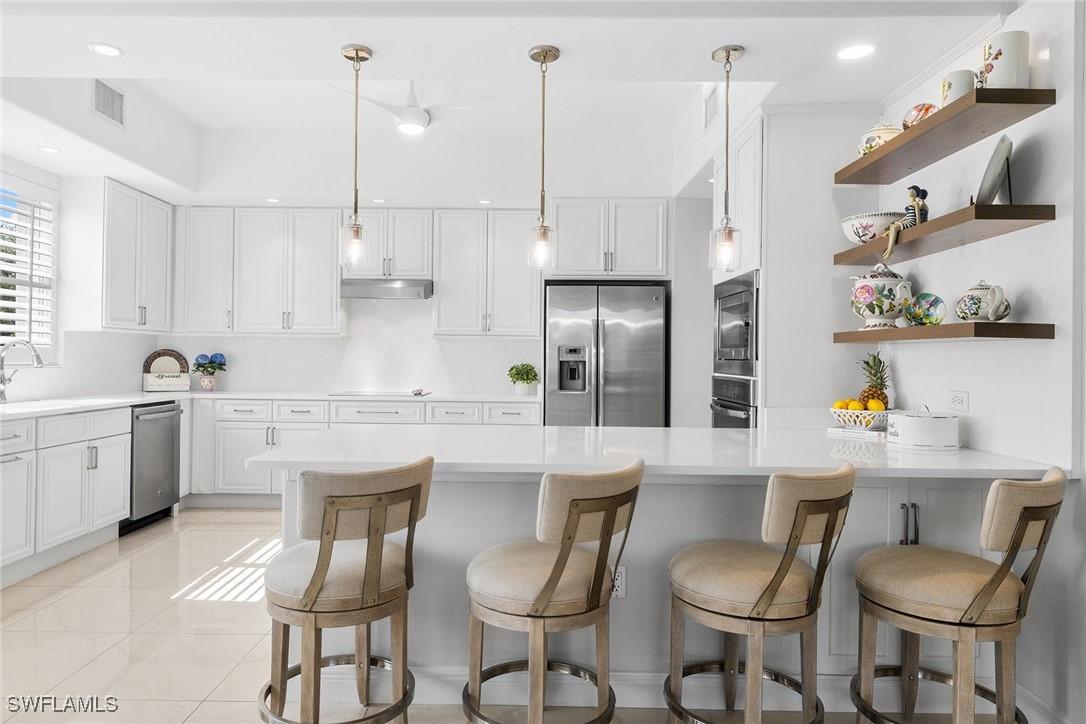 583 Avellino Isles Cir. #202, Naples, FL 34119