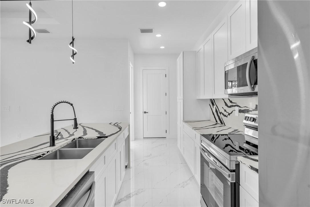 3418 8th St., Lehigh Acres, FL 33976