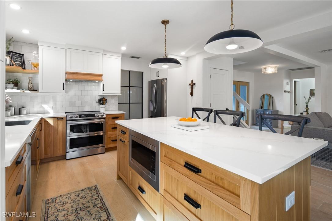 5900 Cypress Hollow Way, Naples, FL 34109