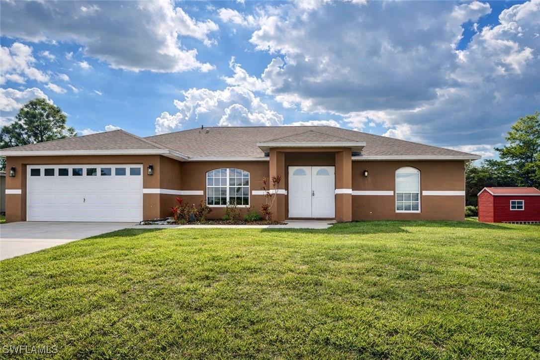 528 Peerless Cir., Lehigh Acres, FL 33974