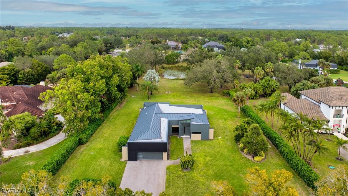 6659 Livingston Woods Ln., Naples, FL 34109