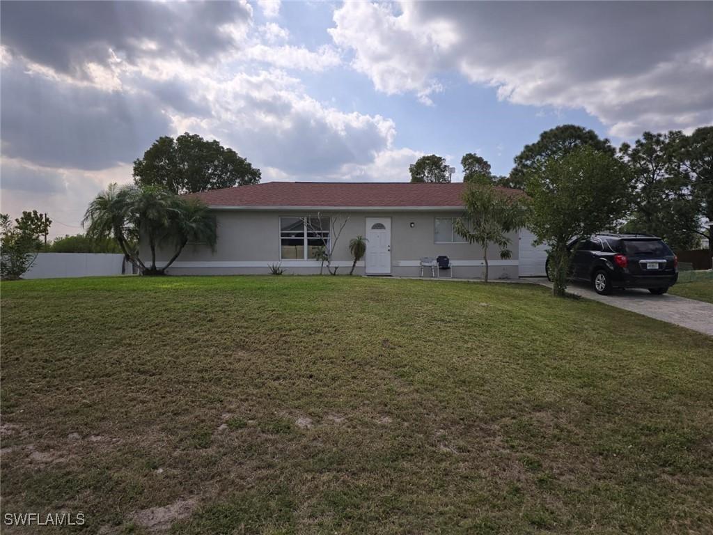 909 Sally Ave., Lehigh Acres, FL 33971