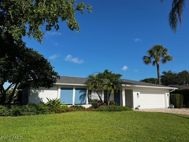 321 Burning Tree Dr., Naples, FL 34105