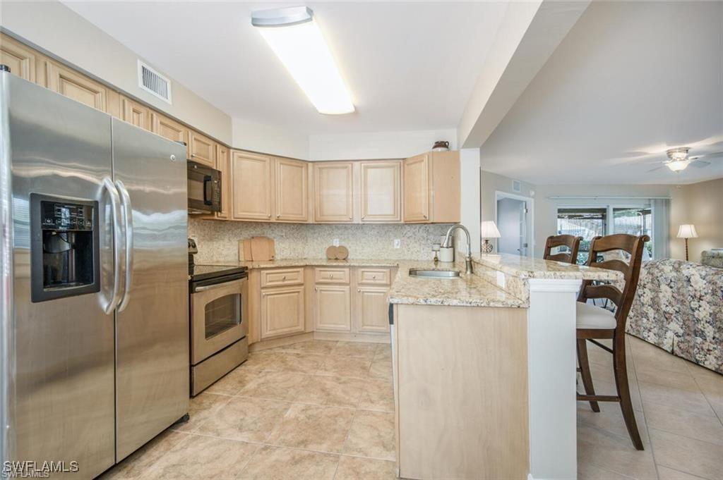 9589 Crescent Garden Dr. #C-102, Naples, FL 34109