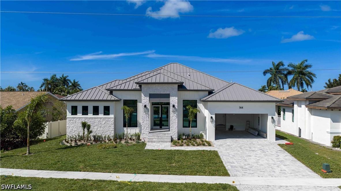 144 Sand Hill St., Marco Island, FL 34145
