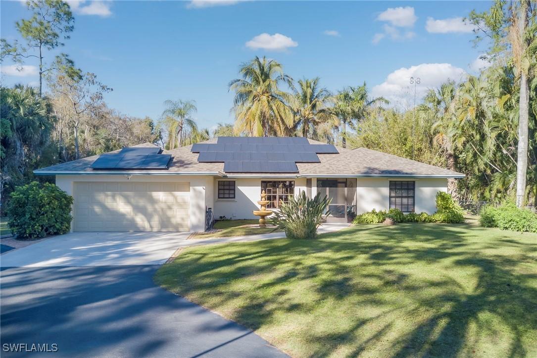 5423 Teak Wood Dr., Naples, FL 34119