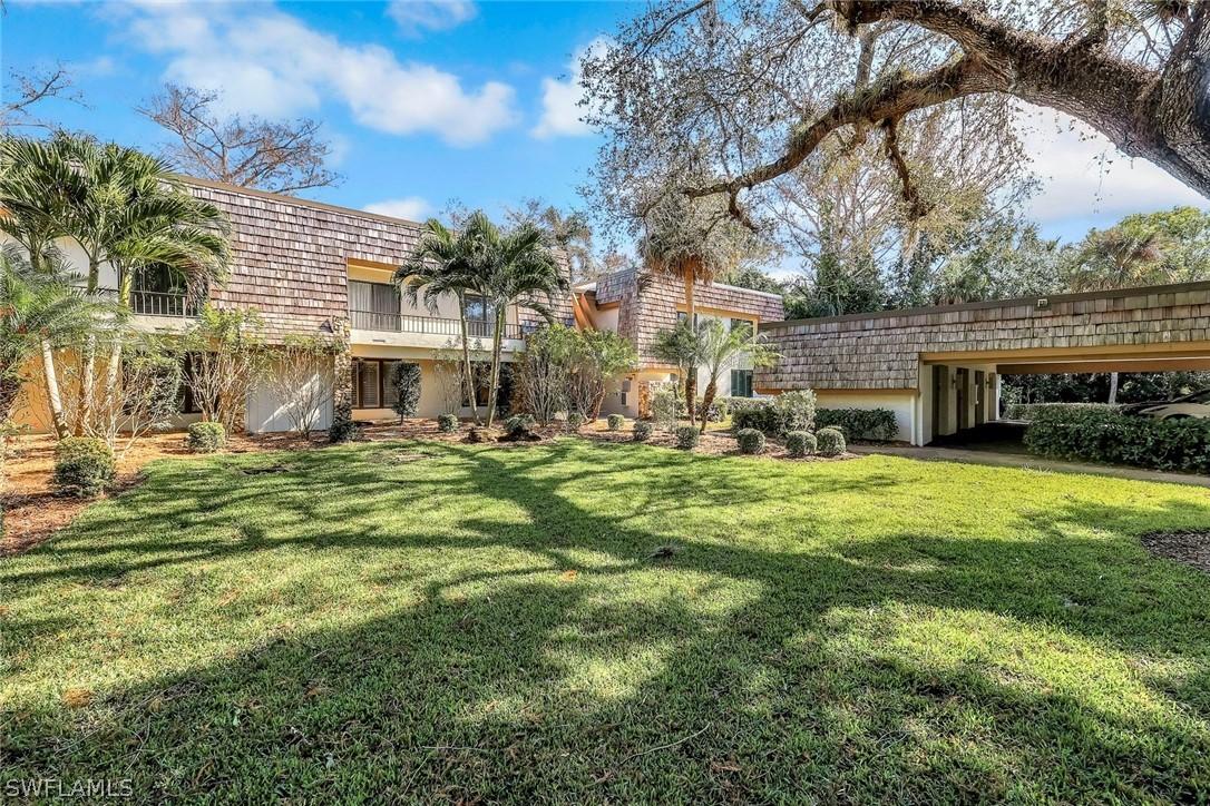 105 Wilderness Dr. #107, Naples, FL 34105