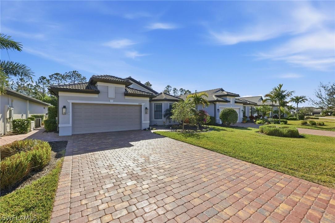 6844 Winding Cypress Dr., Naples, FL 34114