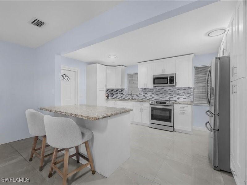 77 Glenmont Dr., North Fort Myers, FL 33917