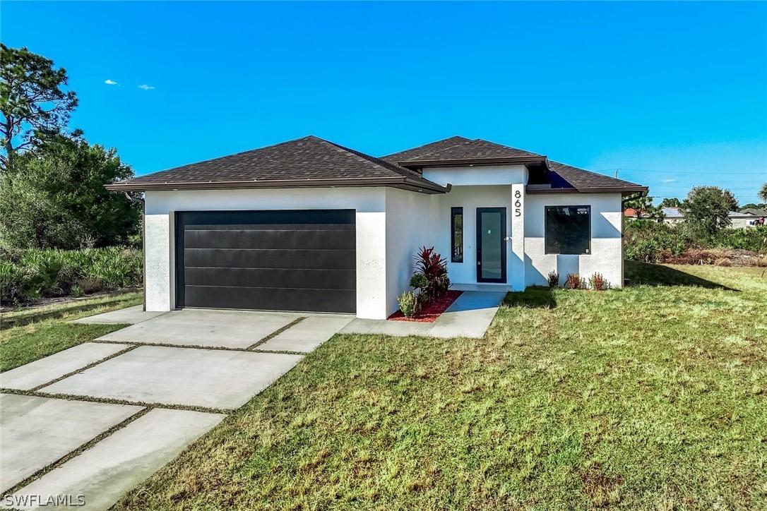 865 Chipley St., Lehigh Acres, FL 33974