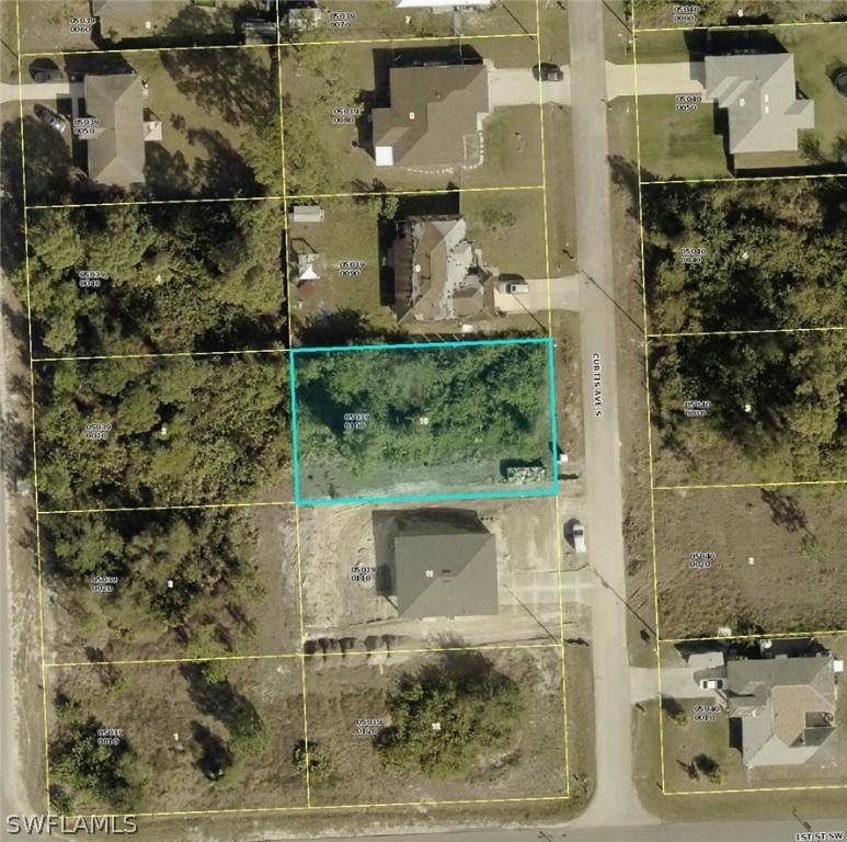 56 Curtis Ave., Lehigh Acres, FL 33976