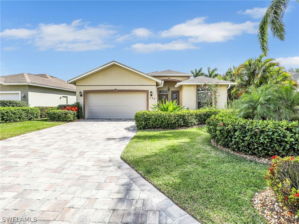 586 Crossfield Cir., Naples, FL 34104