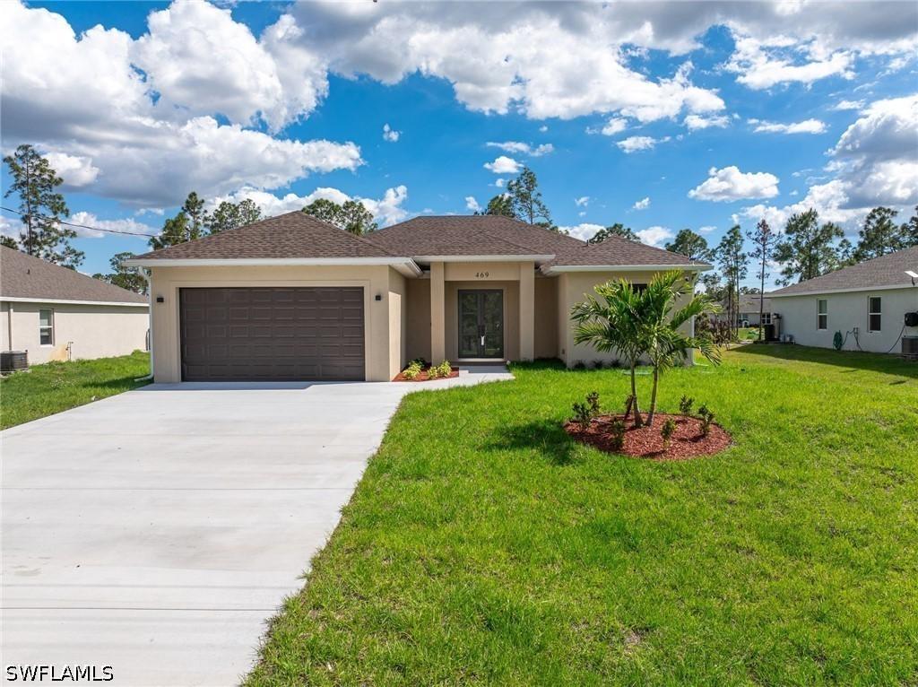 469 Woodman Dr, Lehigh Acres, FL 33972