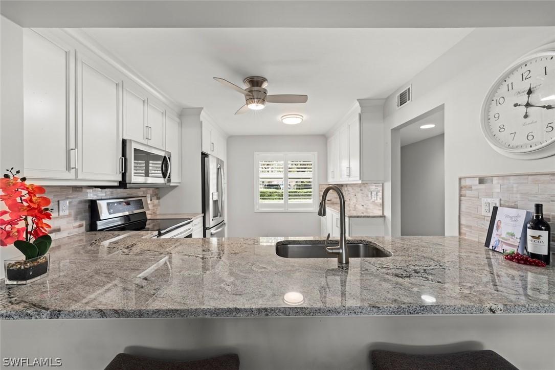 5965 Bloomfield Cir. #B104, Naples, FL 34112