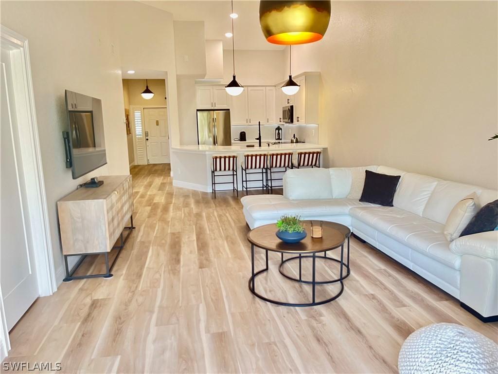 7741 Pebble Creek Cir. #302, Naples, FL 34108