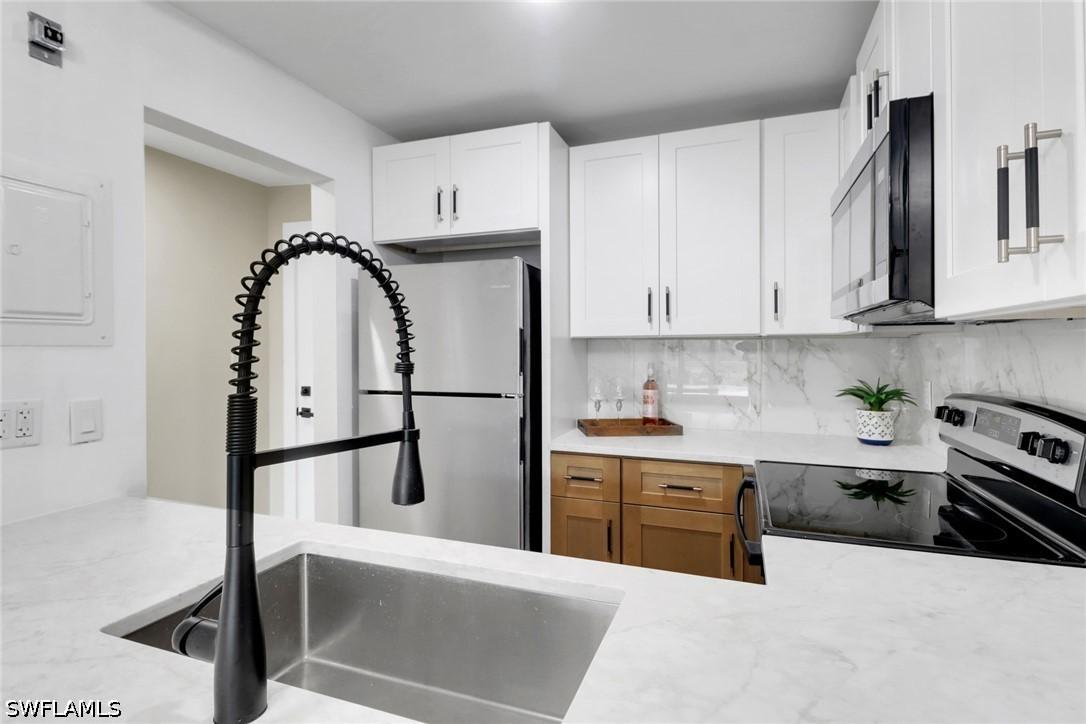 1195 Clam Ct. #202, Naples, FL 34102