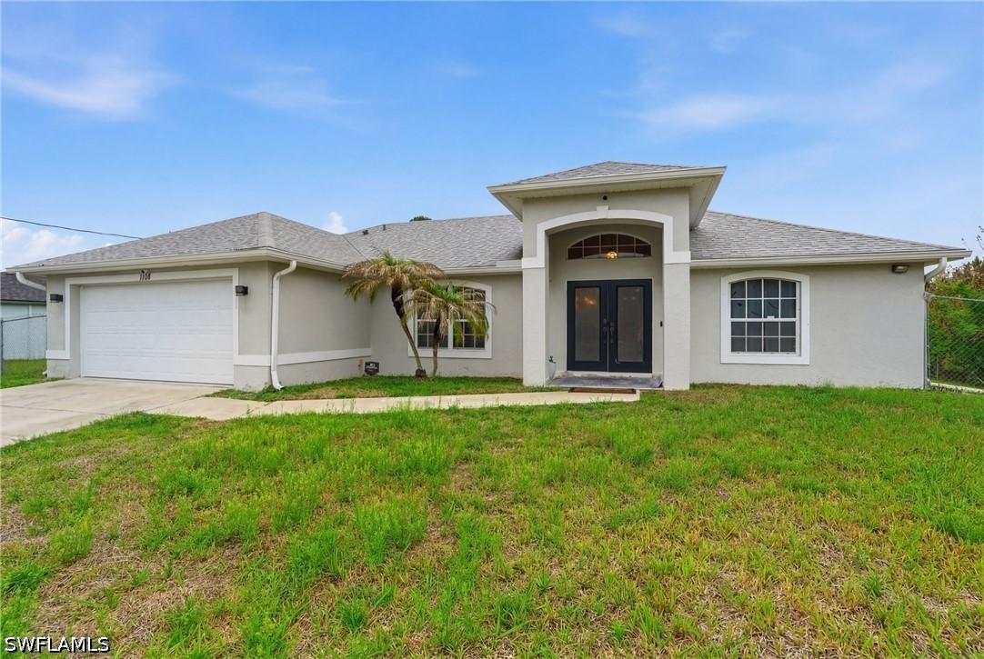 1108 Plumosa Ave., Lehigh Acres, FL 33972