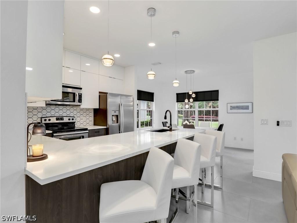 5629 Whisperwood Blvd. #801, Naples, FL 34110