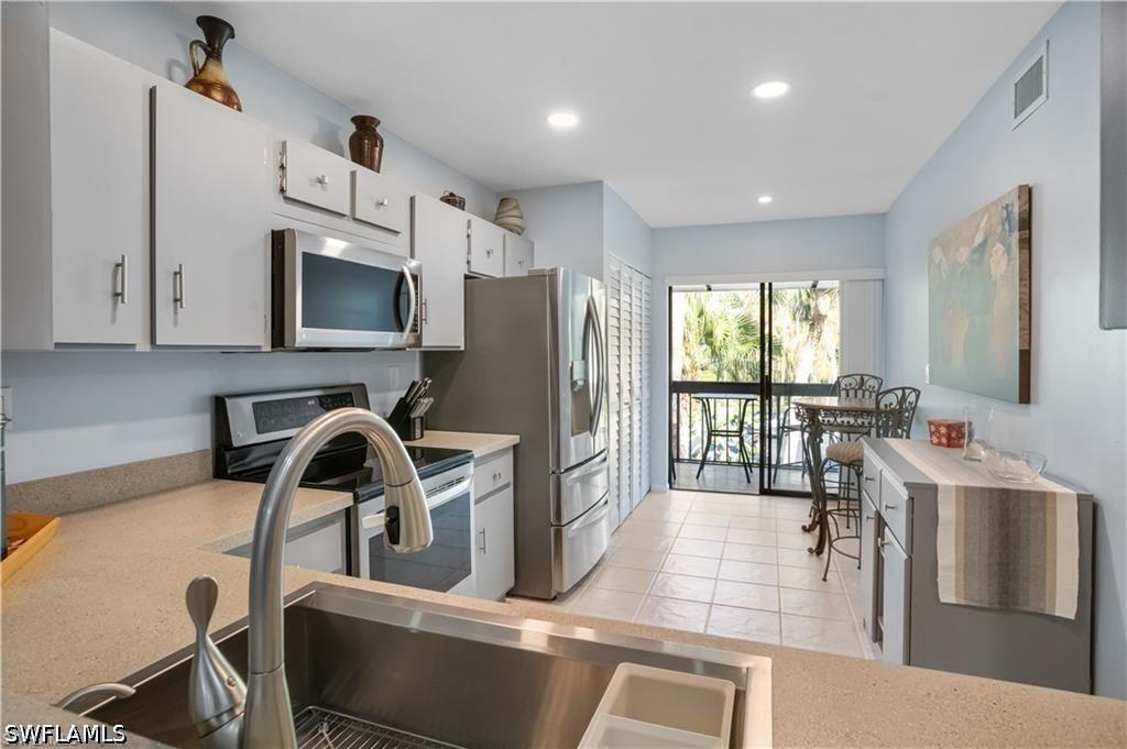 1814 Kings Lake Blvd. #203, Naples, FL 34112