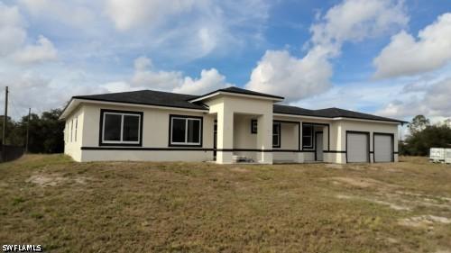 1715 Mcarthur Ave., Lehigh Acres, FL 33972