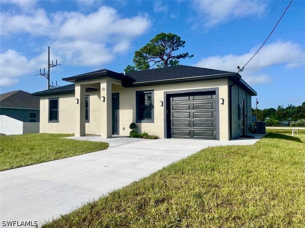 56 Floyd Ave., Lehigh Acres, FL 33976