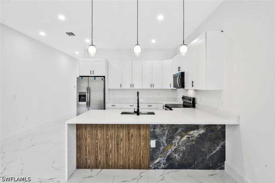 521 Lillon Ave., Lehigh Acres, FL 33974