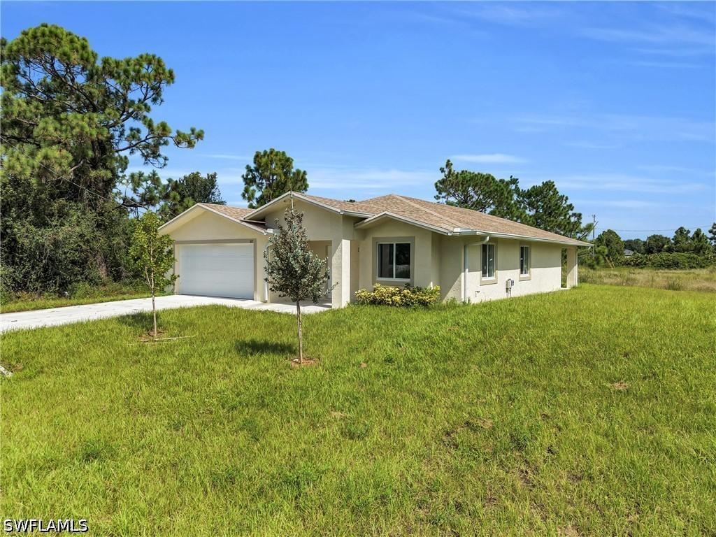 875 Cervantes St., Lehigh Acres, FL 33974