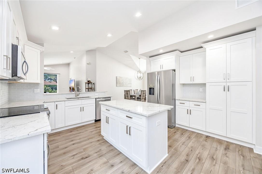1671 Triangle Palm Ter., Naples, FL 34119