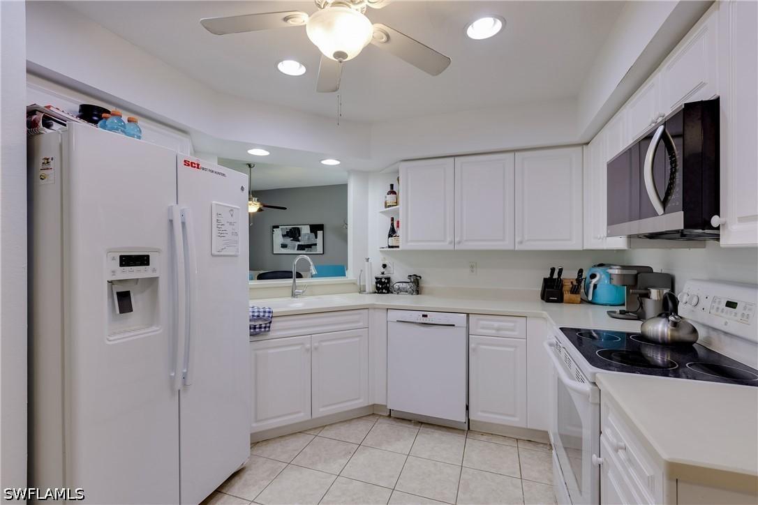 25080 Peacock Ln. #102, Naples, FL 34114