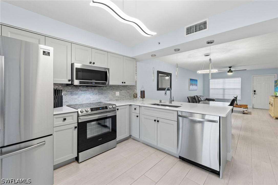 4975 Sandra Bay Dr. #103, Naples, FL 34109