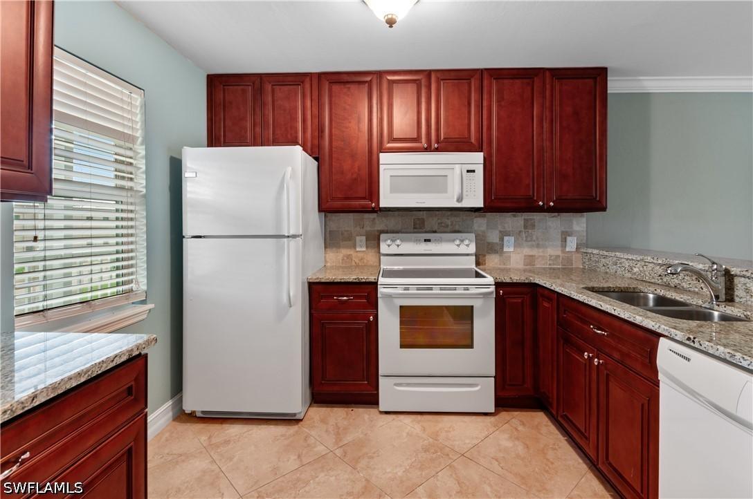 829 W Elkcam Cir. #2-208, Marco Island, FL 34145
