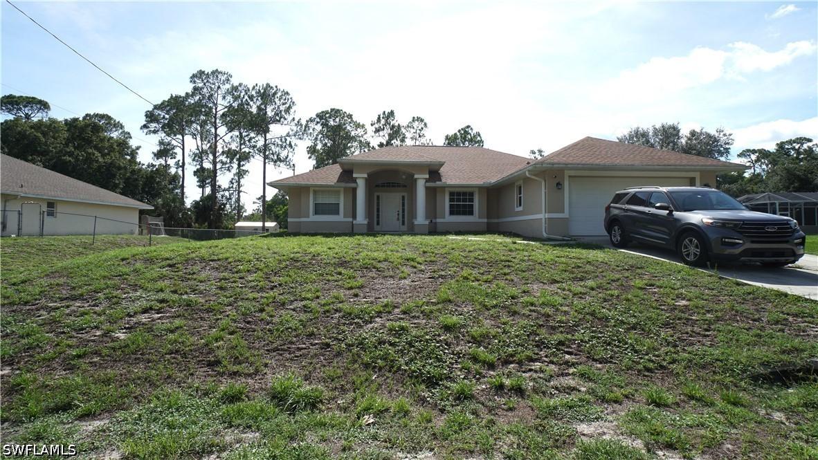 413 Truman Ave., Lehigh Acres, FL 33972