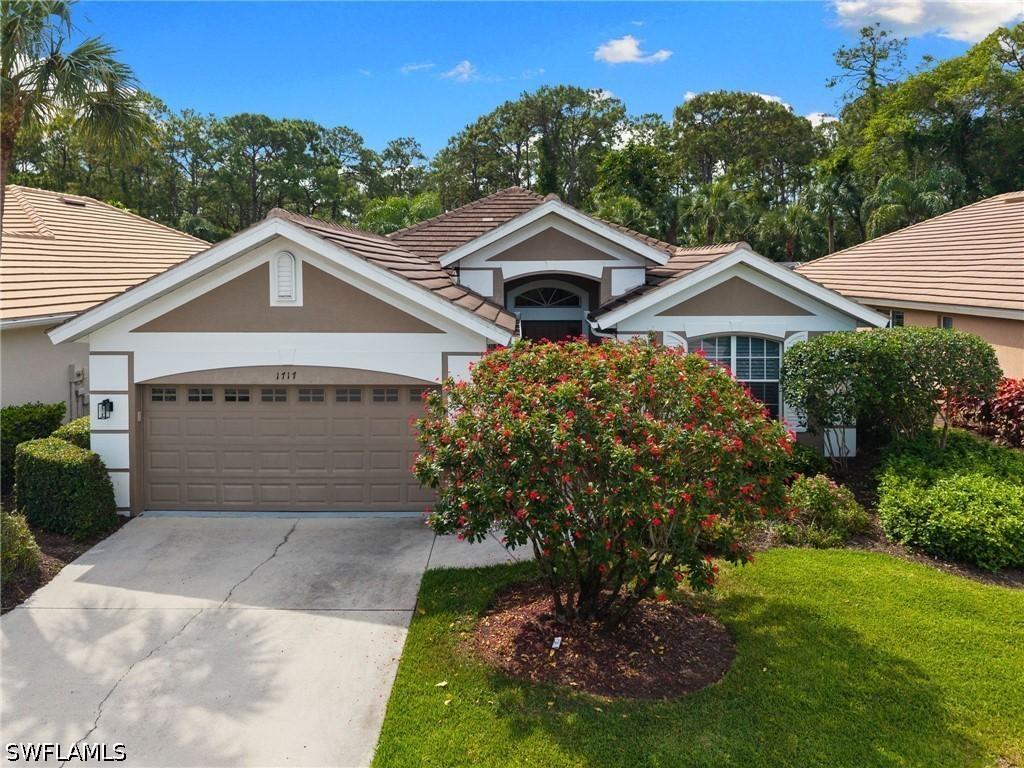 1717 Winding Oaks Way, Naples, FL 34109