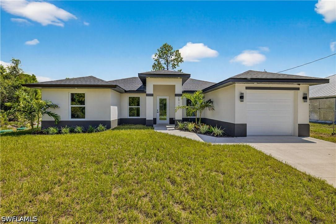 569 Aspen Ave., Lehigh Acres, FL 33974