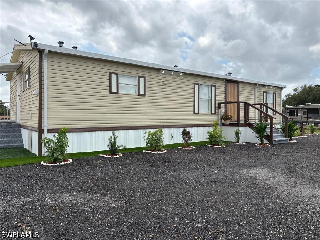 555 N Palomino St., Montura Ranches, FL 33440